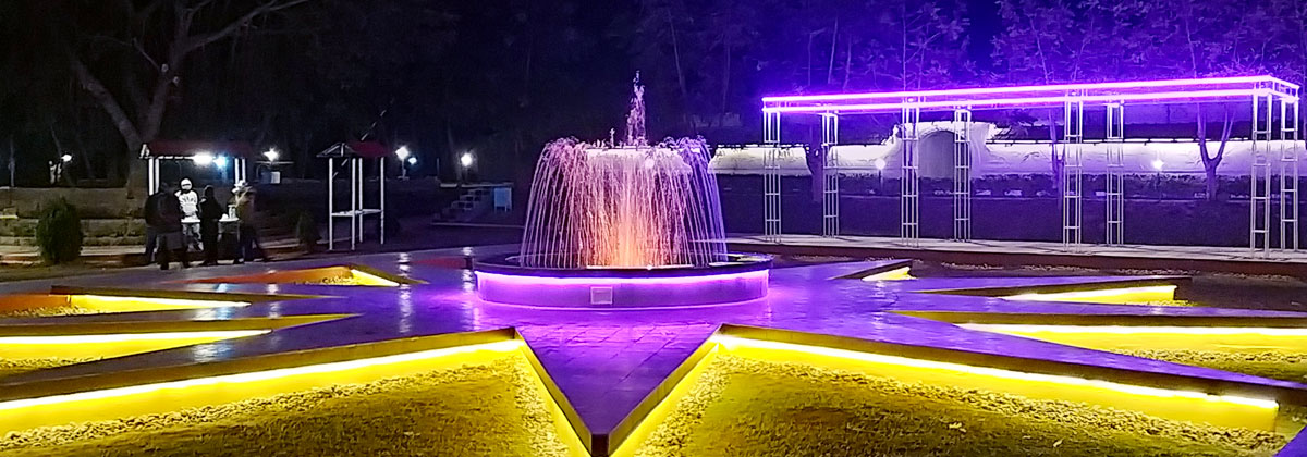 A star shaped platform with the colored fountain in the centre