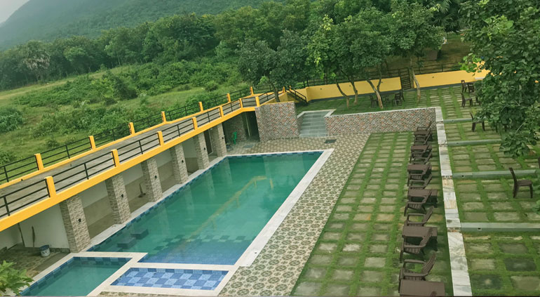 A rain bathed night washing the pathway to welcome guests at Panchet Residency, Purulia
